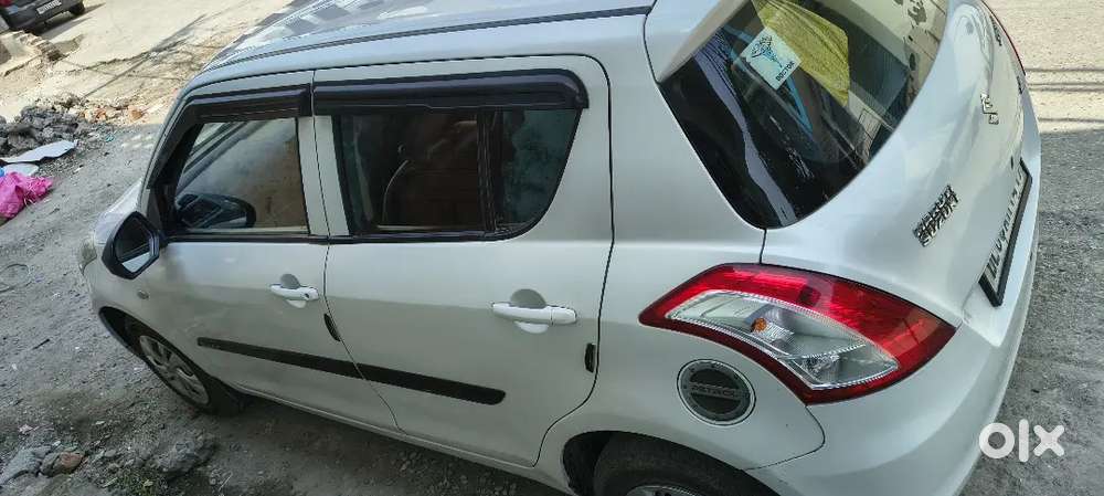 Maruti Suzuki Swift Lxi 2014