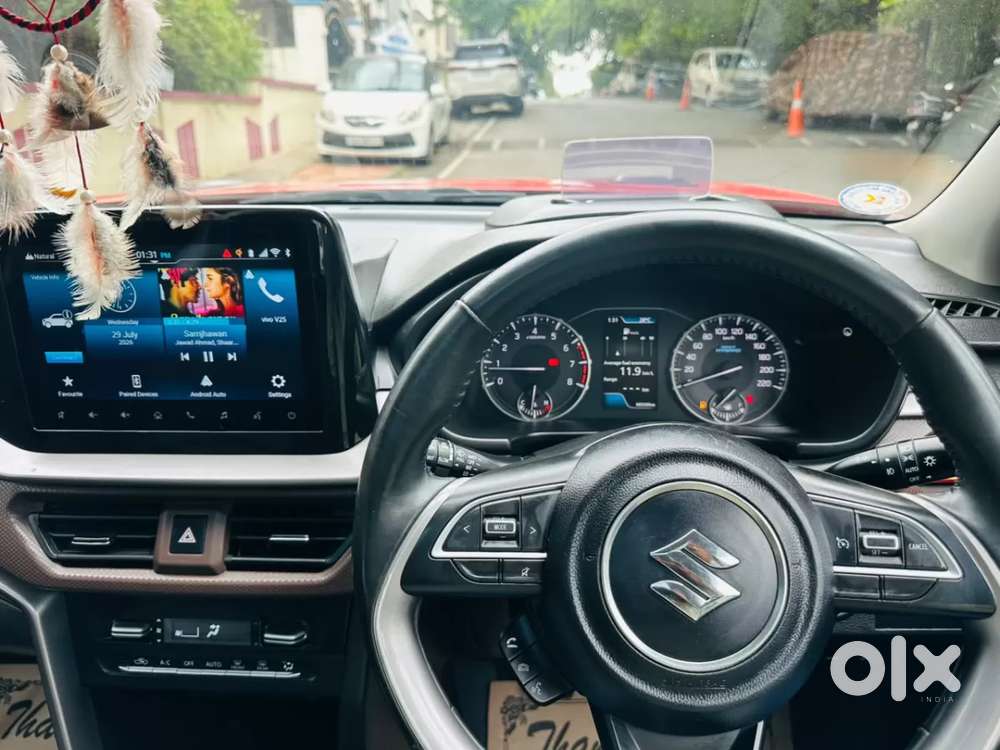 Maruti Suzuki Brezza 1.5 Zxi Plus Smart Hybrid Dual Tone, 2023, Petr..