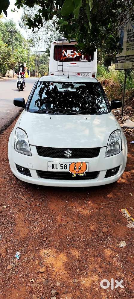 Swift Vxi White Colour
