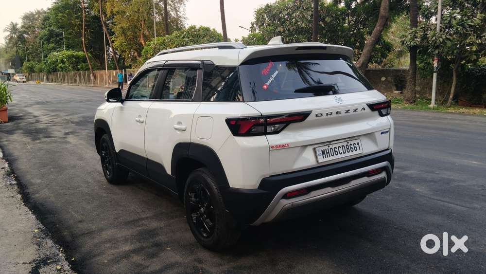 Maruti Suzuki Brezza 1.5 Zxi Plus Smart Hybrid Dual Tone, 2023, Petr..