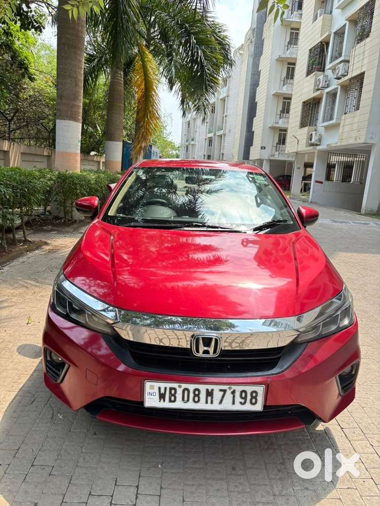 5th Generation Red Colour Honda City V Model Driven By A Ca