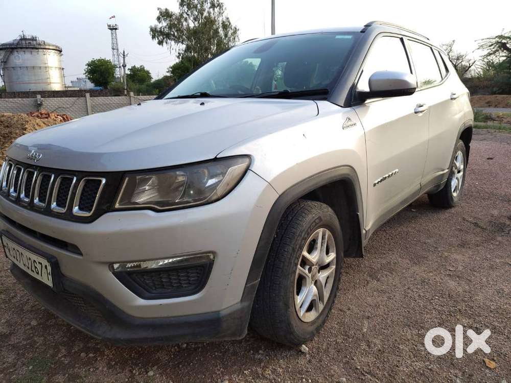 Bank Manager's Single Handed Silver Jeep Compass