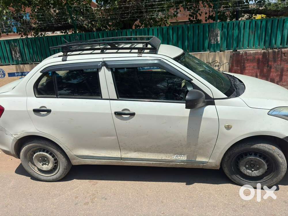 Dzire 1.2 Vxi 2021 Km Driven