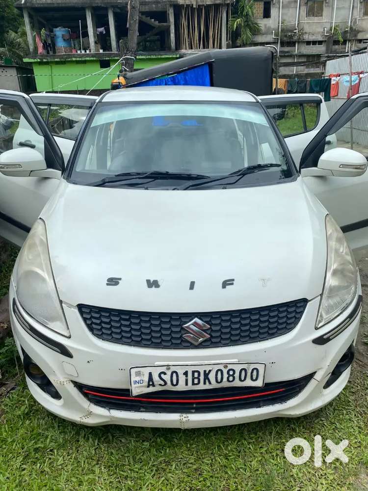 Maruti Suzuki Swift Lxi 2014
