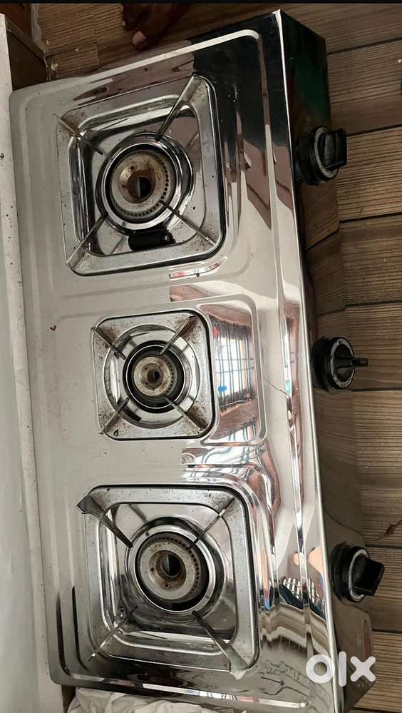 Teak cot and bed along with sanyo old 3 burner gas stove