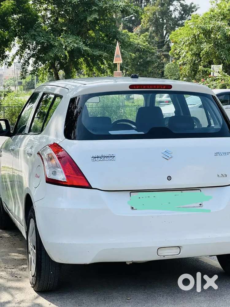 2015 Maruti Suzuki Swift Lxi Optional-o