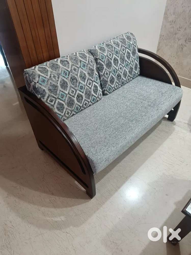 Four seater sofa, 2 single seater chairs with centre table