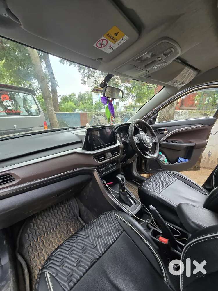Maruti Suzuki Brezza 2024 Petrol 27000 Km Driven (automatic)