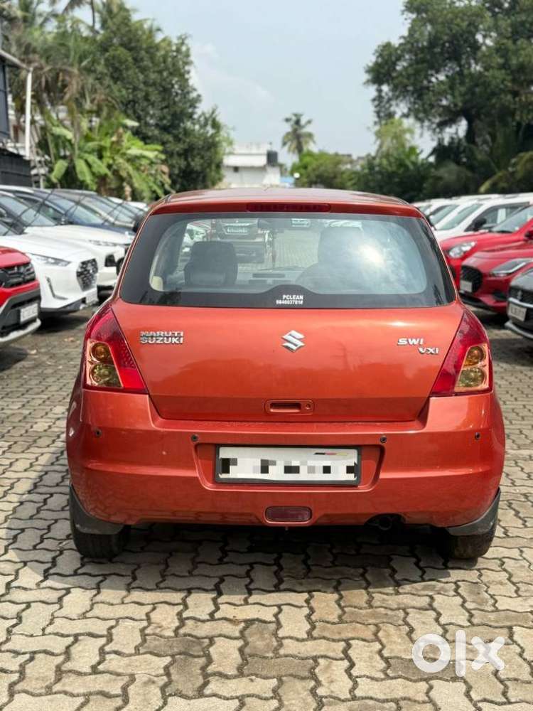 Maruti Suzuki Swift 1.2 Vxi (o), 2009