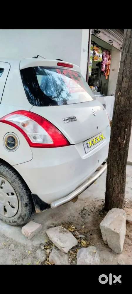 Maruti Suzuki Swift Lxi 2016