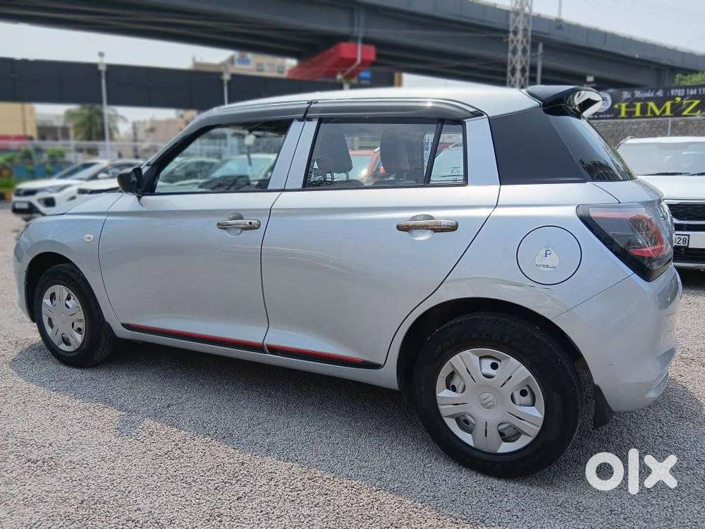Maruti Suzuki Swift 1.2 Lxi (o), 2024, Petrol