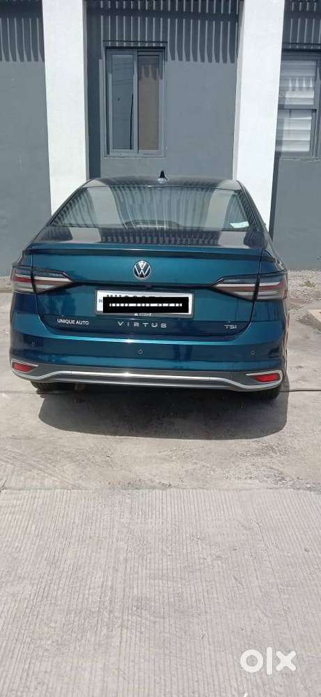 Virtus Petrol Auto 2023 Lava Blue Showroom Condition