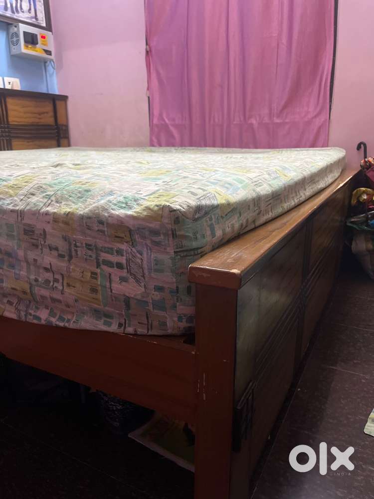 Wood cot and king size bed