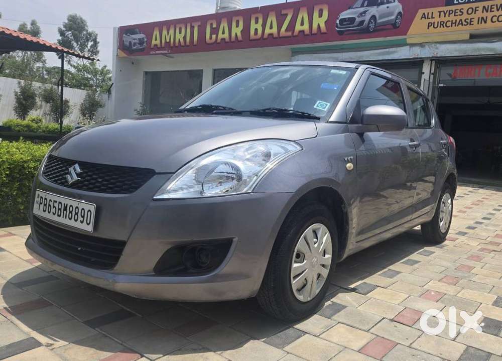 Maruti Suzuki Swift Lxi Optional-o, 2013, Petrol
