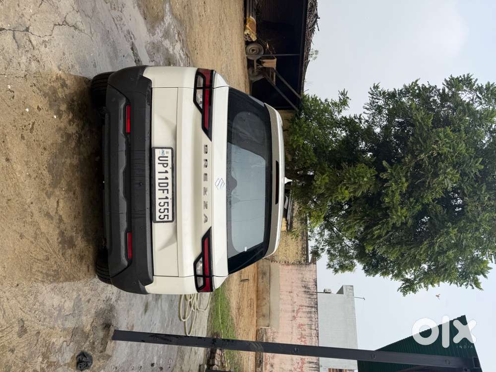 Maruti Suzuki Brezza Vxi At 2025