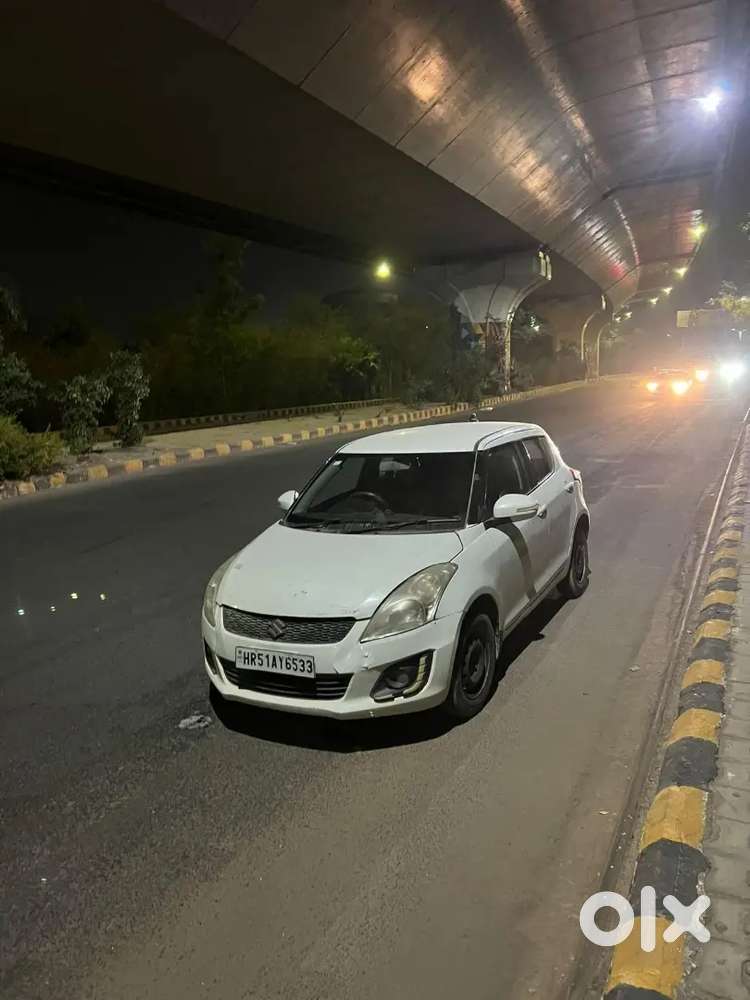 Maruti Suzuki Swift Lxi 2014