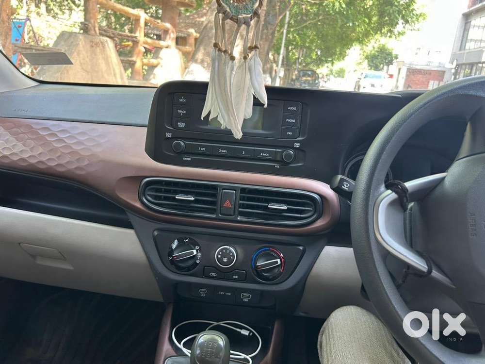 Texi Parcing Car  Aura 2025 Model