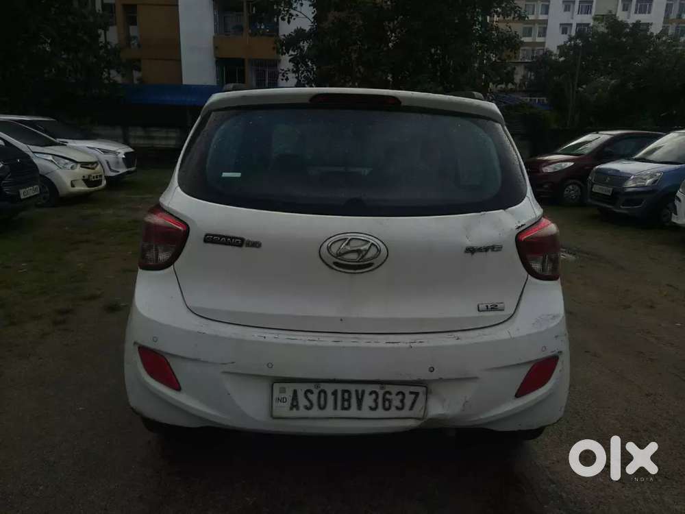 Hyundai Grand I10 Prime 2015 White Colour Petrol 90000 Km Driven