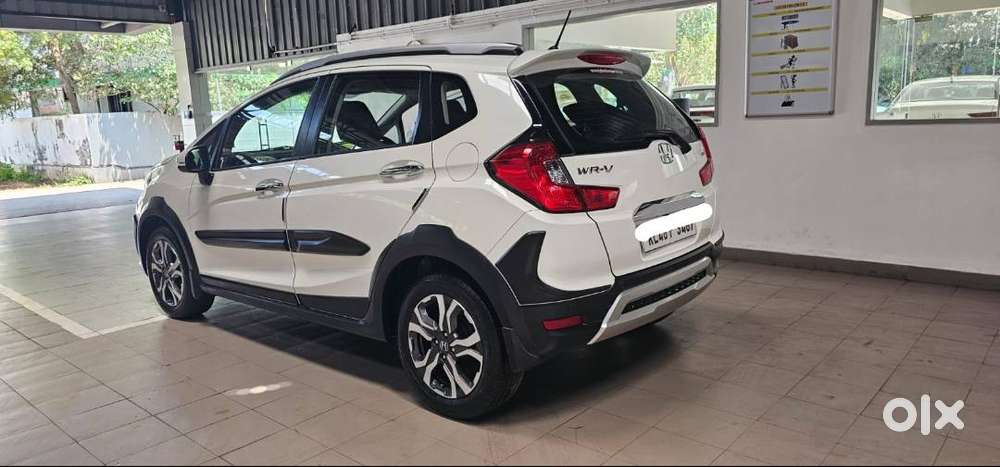 Only 27000 Kilometer Orgin Kerala Full Option With Sunroof