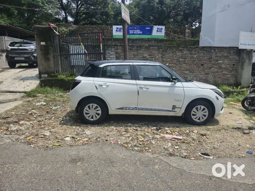 Maruti Suzuki Swift Vxi 2026
