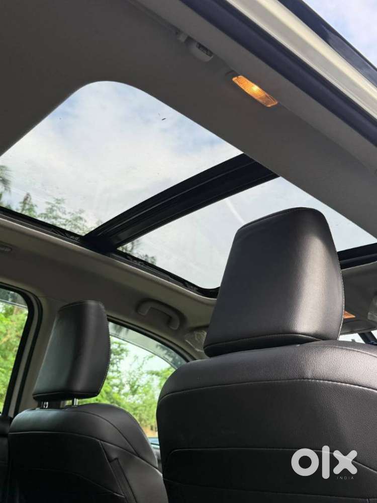 Maruti Suzuki Grand Vitara 1.5 Alpha Plus Dual Tone Intelligent Hybr..
