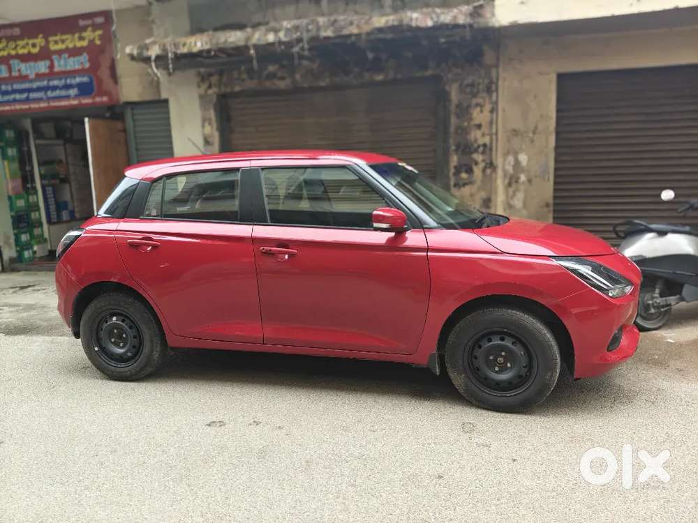Maruti Suzuki Swift VXi 2024 model car