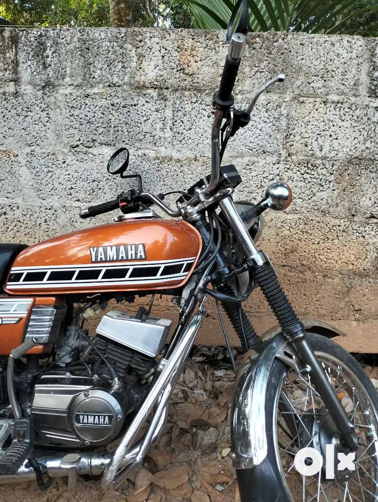 Rx 100 deals bike orange colour