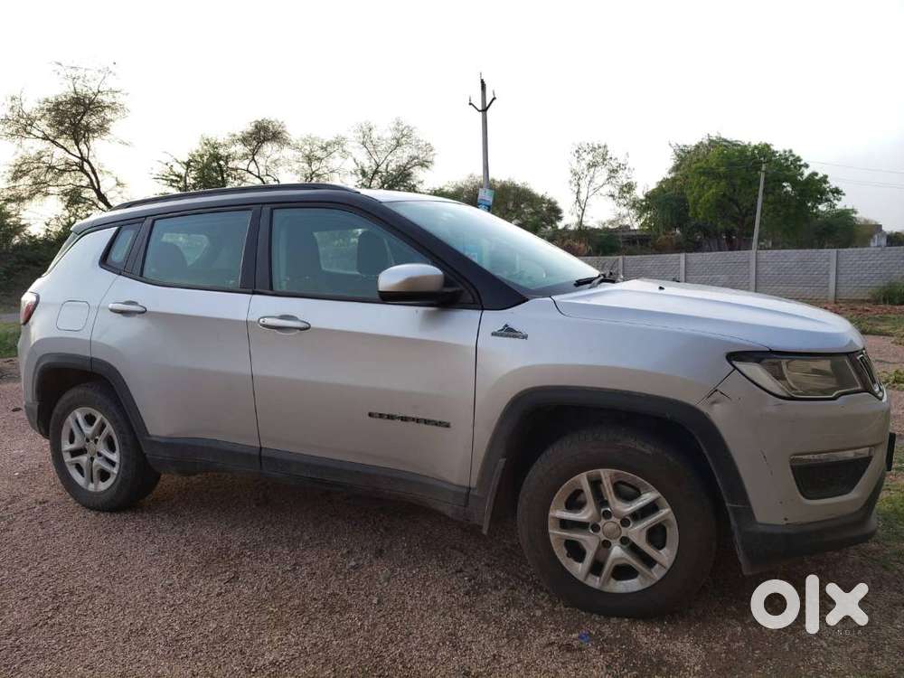 Bank Manager's Single Handed Silver Jeep Compass