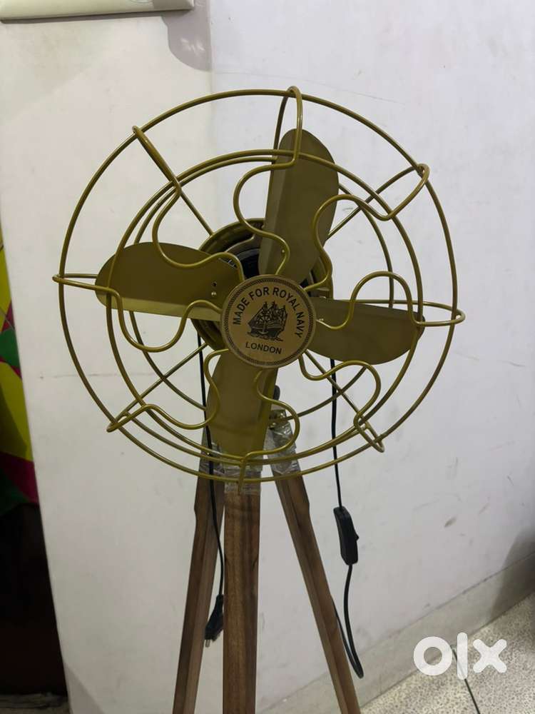 Standing fan.It is look like a tripod with switch and hight adjustable