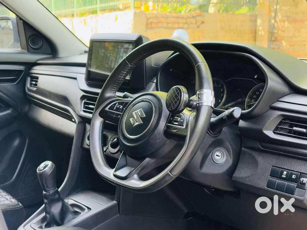 Maruti Suzuki Brezza 1.5 Lxi Smart Hybrid, 2024, Petrol