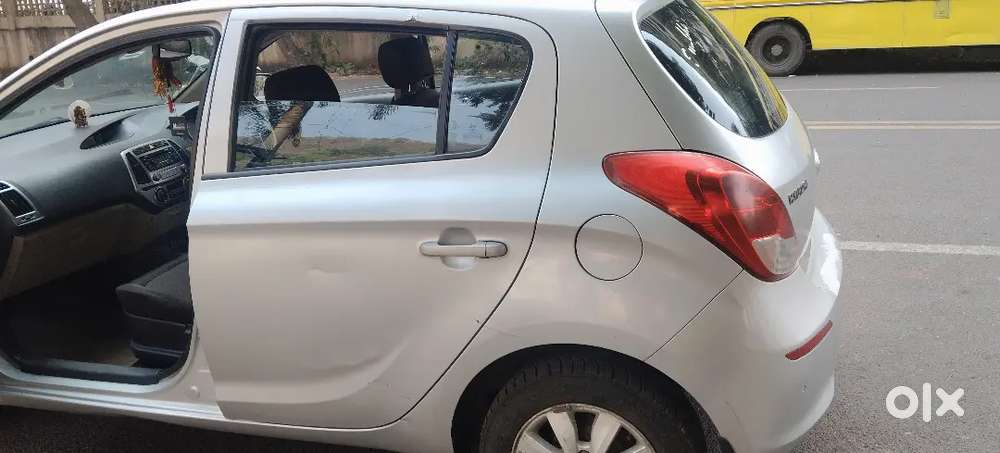 I20, 2nd Owner, Gujrat Registration, Petrol, Sportz ,silver Color,.