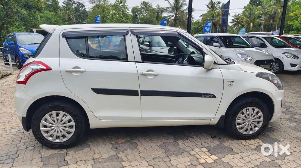 Maruti Suzuki Swift Lxi Optional-o, 2015, Petrol