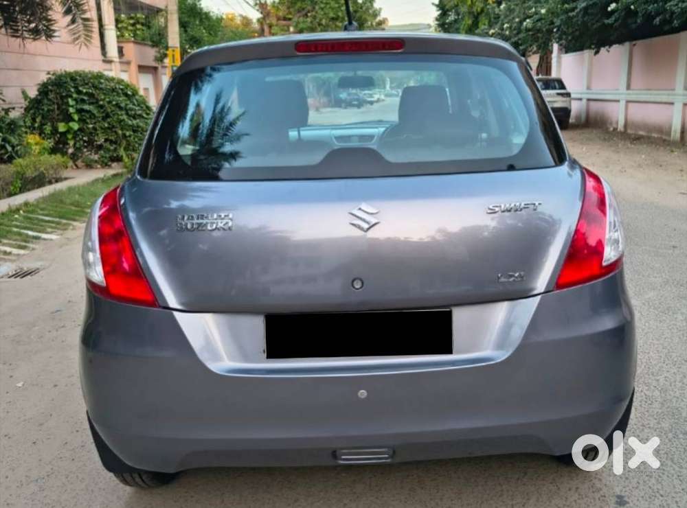 Maruti Suzuki Swift Lxi Optional-o, 2015, Petrol