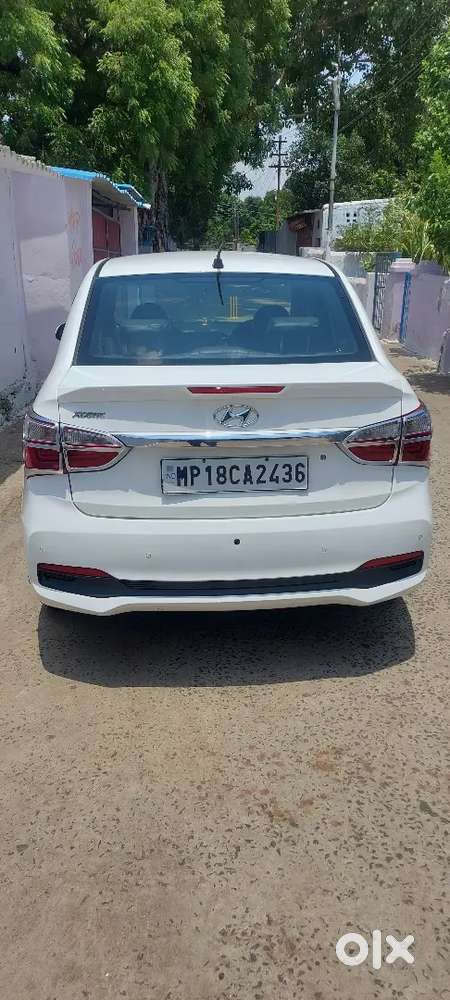 Hyundai Xcent Cng + Petrol  40,000 Km  32 Km/kg Mileage  Excellent