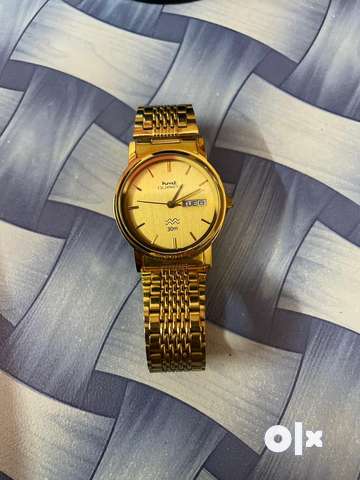 Hmt watch golden clearance colour