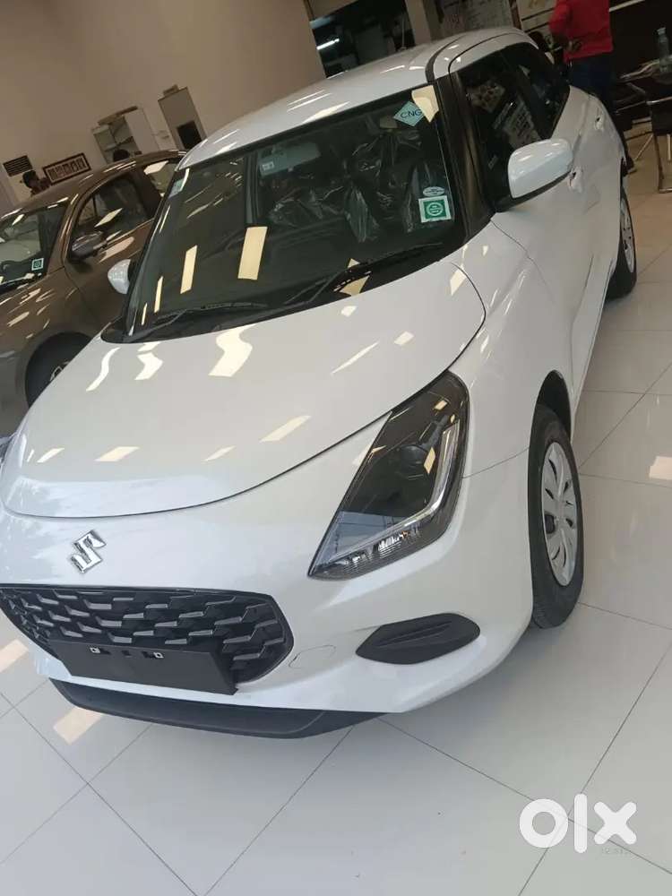 Maruti Suzuki Swift Vxi 2026