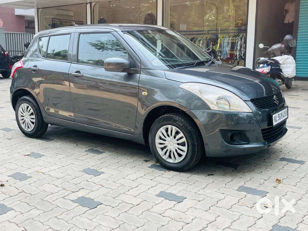 Maruti Suzuki Swift Lxi Optional-o, 2015, Petrol