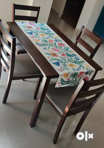 Home centre dining table deals 4 seater