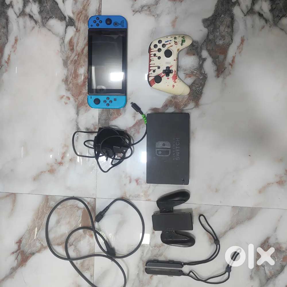 Nintendo switch v2 (500GB) SD card and free controller and PS4