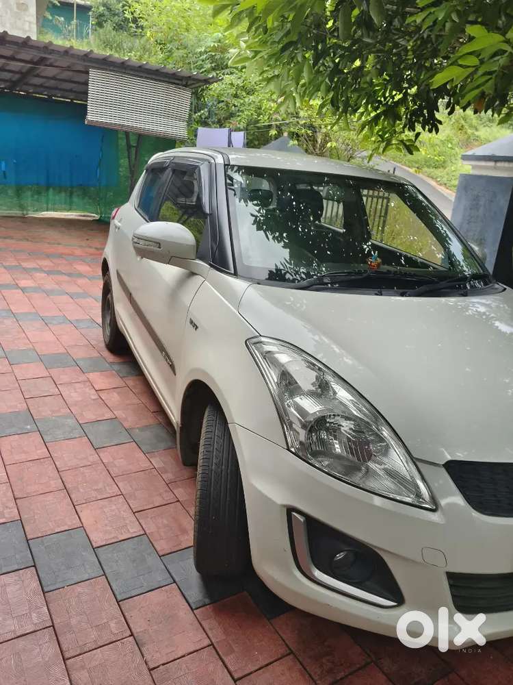 Maruti Suzuki Swift Lxi 2015