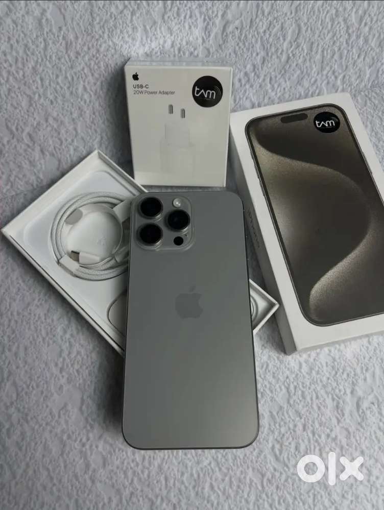 Iphone 15 pro max natural titanium next to new condition  battery