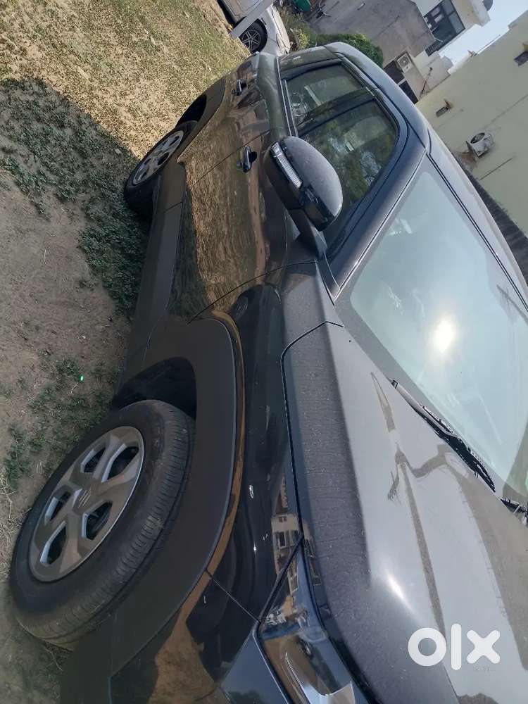 Maruti Suzuki Brezza Vxi 2026