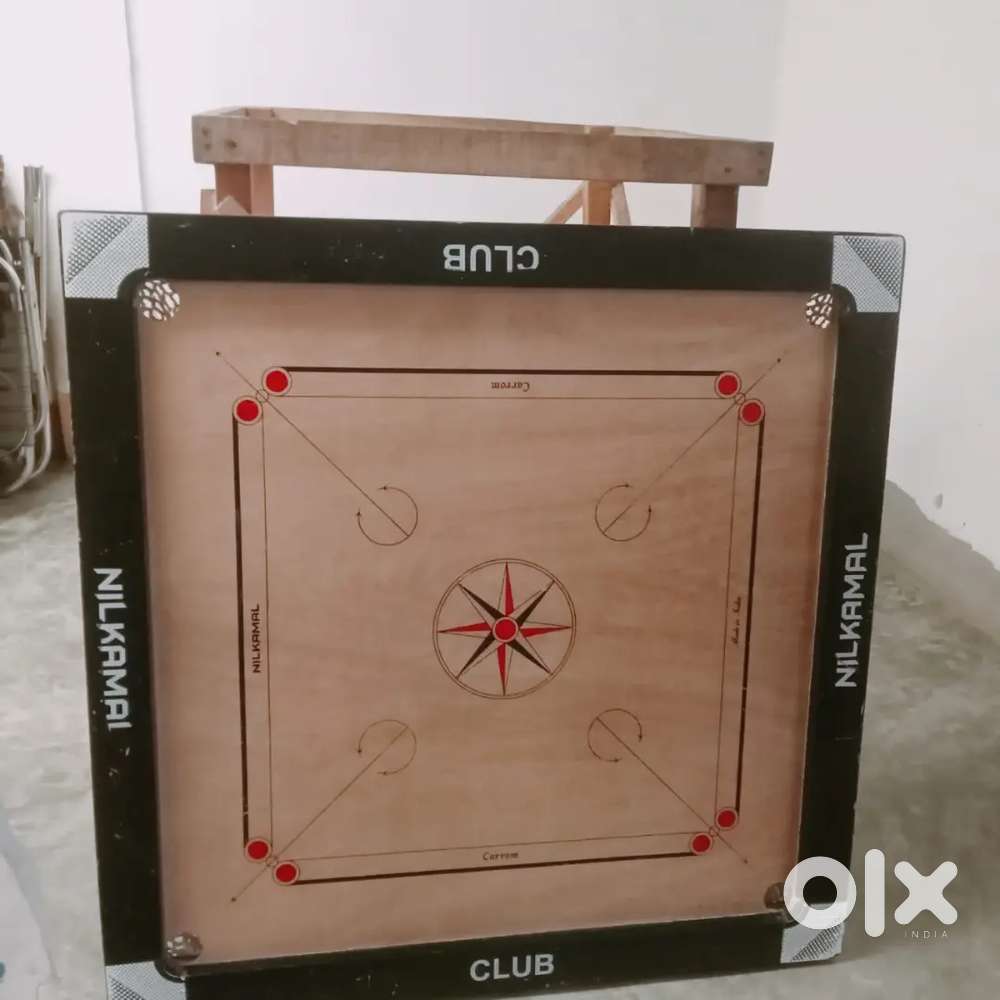 Carrom board with frame