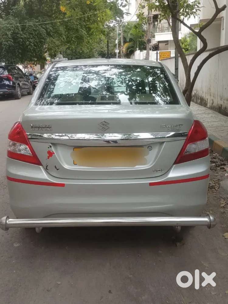 Maruti Suzuki Swift Dzire 2015 Yellow Board