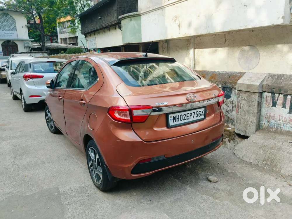 Urgent Sale Tata Tigor 2017 2nd Owner Top Model Fully Loaded