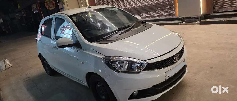 It's Tata Tiago Diesel Excellent Condition With Ceramic Cote