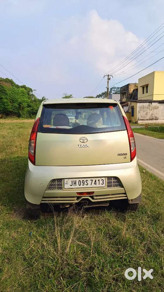Tata Nano Lx 2012 Magenta Green Colour