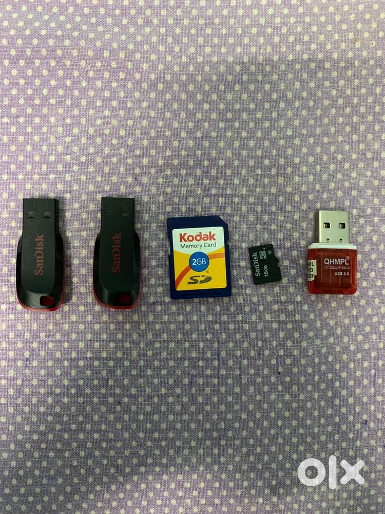 Sandisk Cruzer blade. Kodak memory card. Sandisk memory card.