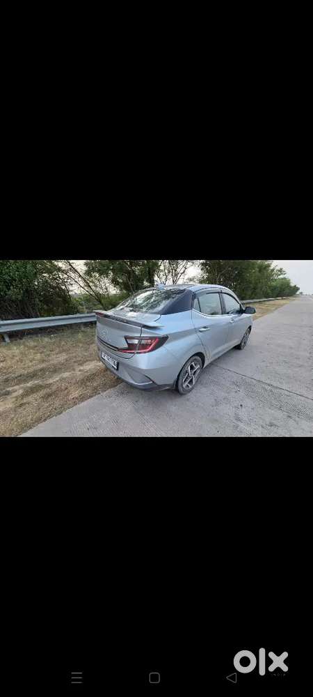 Hyundai Aura 2023 Cng & Hybrids 68000 Km Driven Top Modal