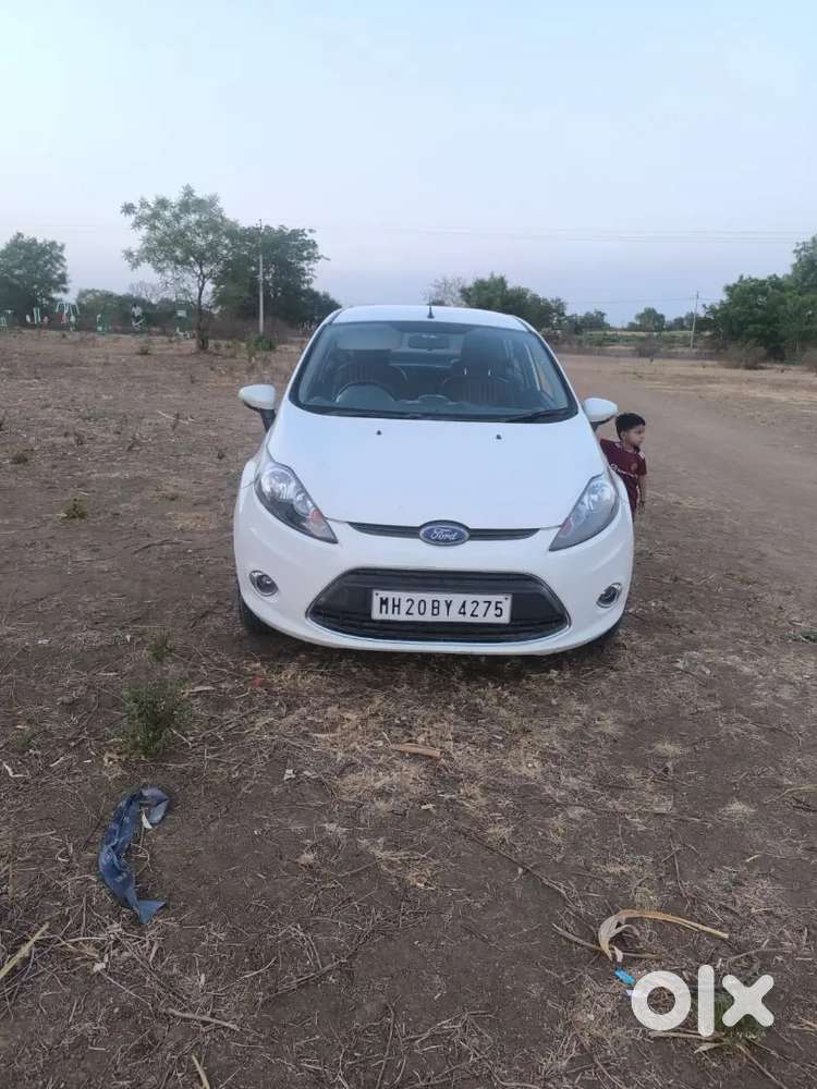 2017 Maruti Suzuki Brezza Zdi I10 2016 Fiesta 2011